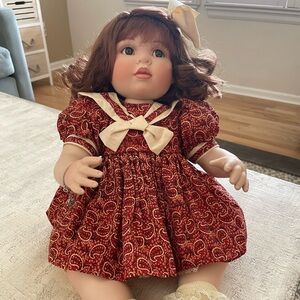 Marie Osmond Adorable Red Paisley Doll with Cream Accents